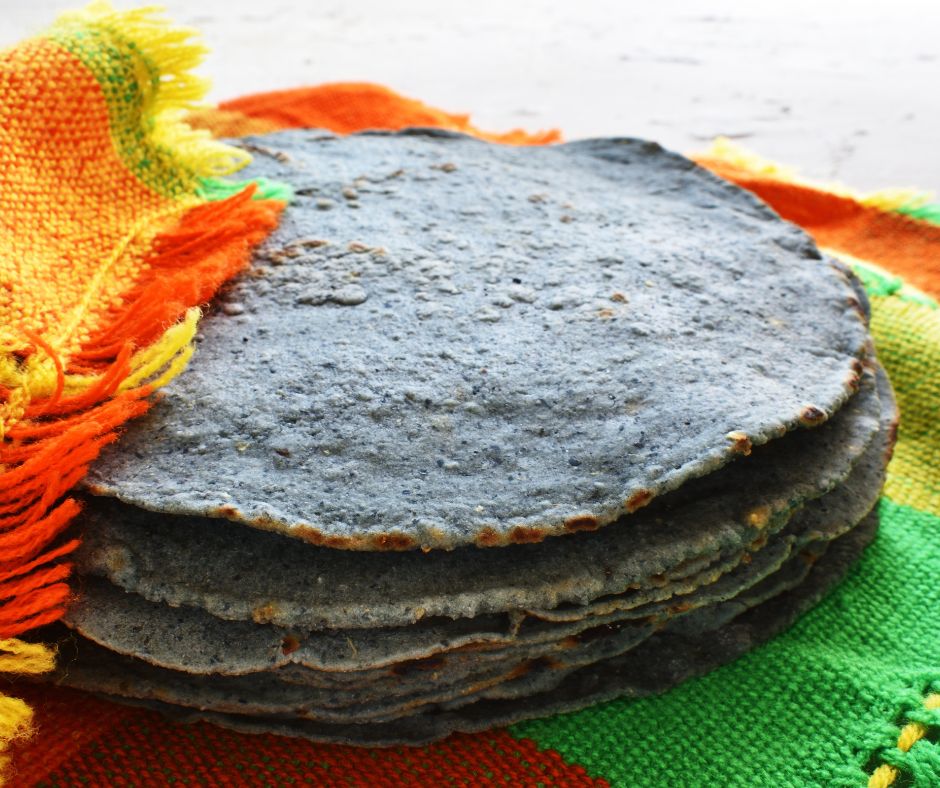 Stack of blue corn tortillas served in the best tacos London at Proper Tacos