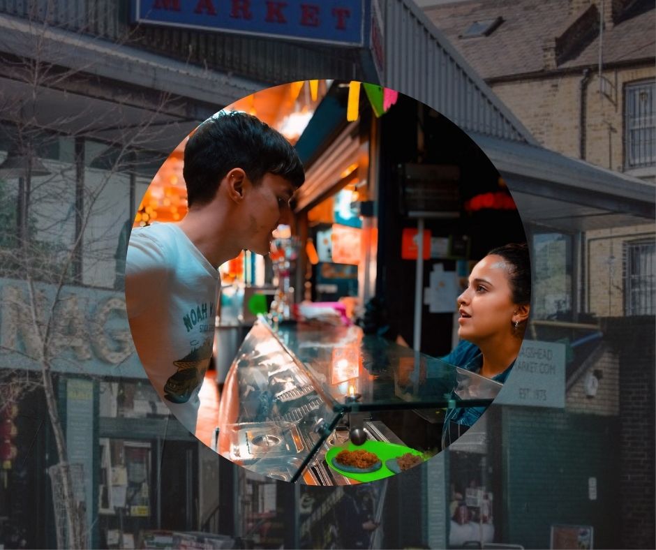 customer ordering nags head market tacos at Proper Tacos stall inside North London market
